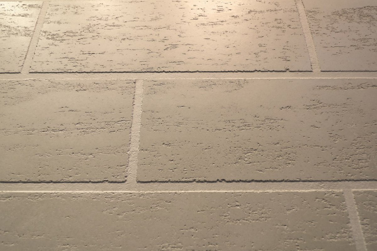 Штукатурка Travertino серая