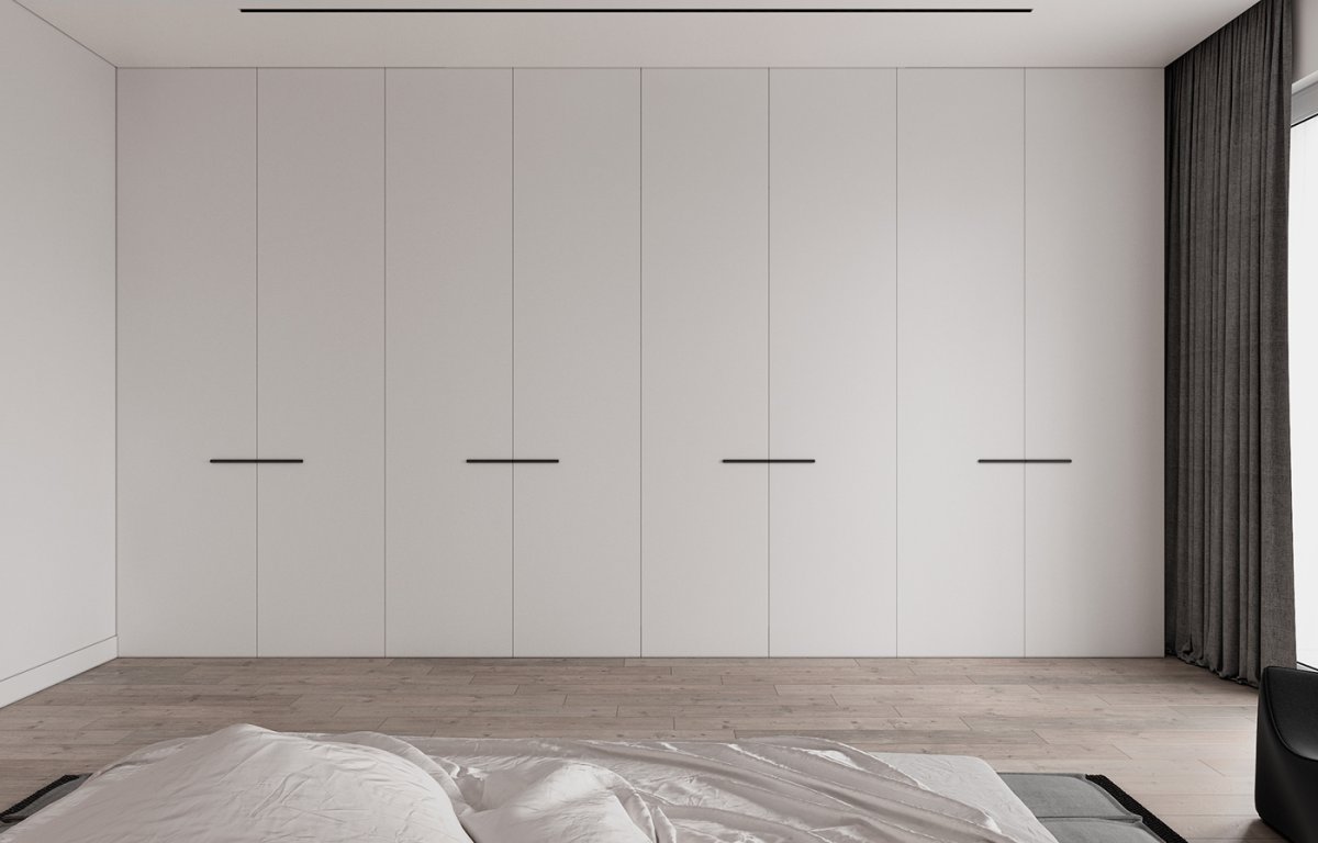 Шкаф в спальню с длинными черными ручками