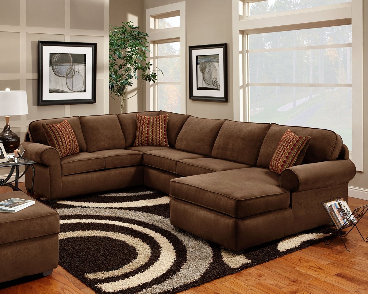 Серый угловой диван в интерьере