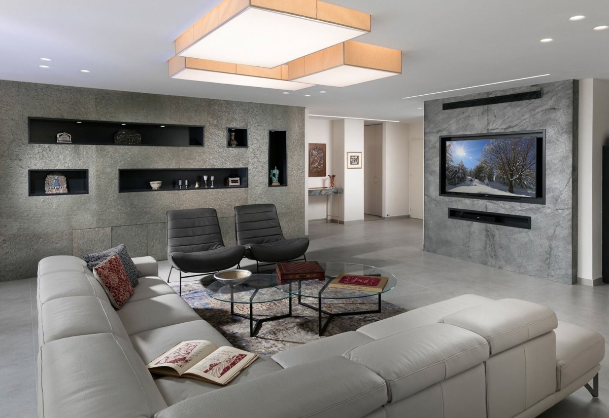 Гибкий мрамор в интерьере гостиной