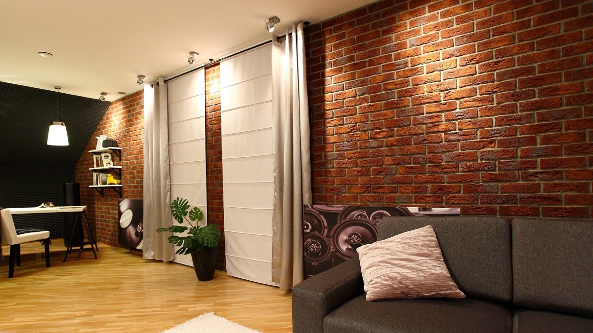 Искусственный камень в интерьере кухни с обоями