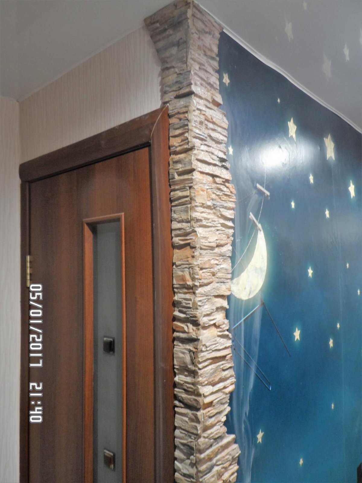 Отделка искусственным камнем дверных проемов