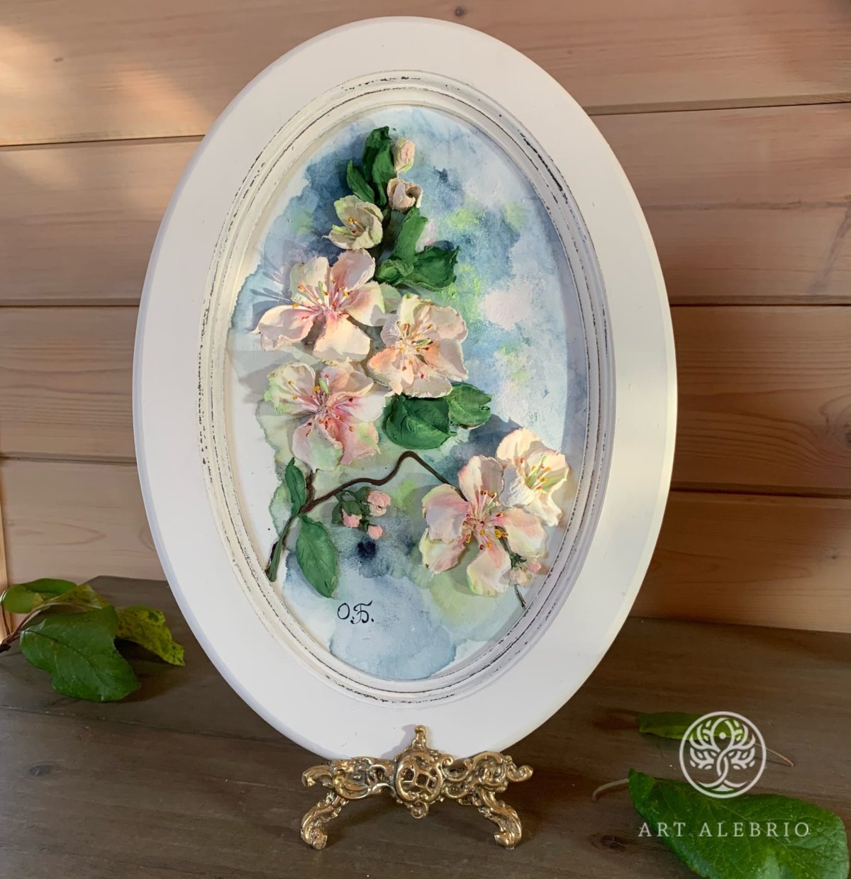 Овальная репродукция в раме