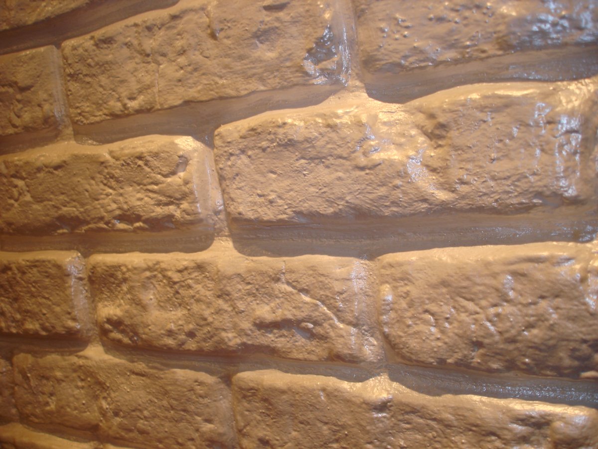 Гипсовая штукатурка под камень