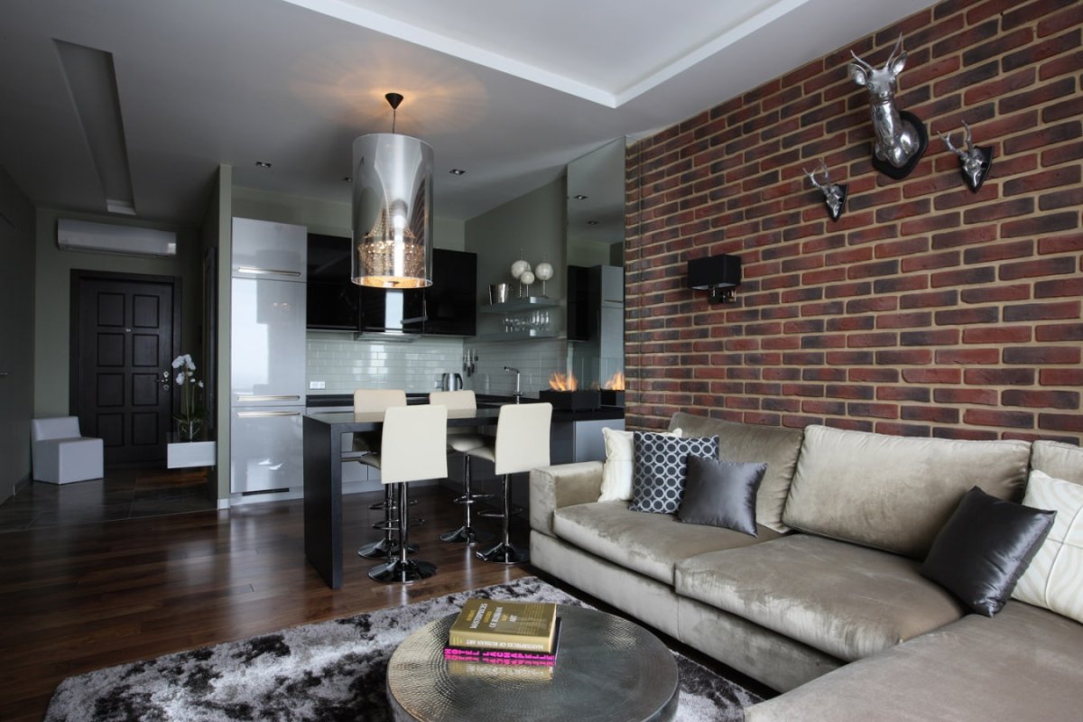 Кирпич в интерьере кухни гостиной