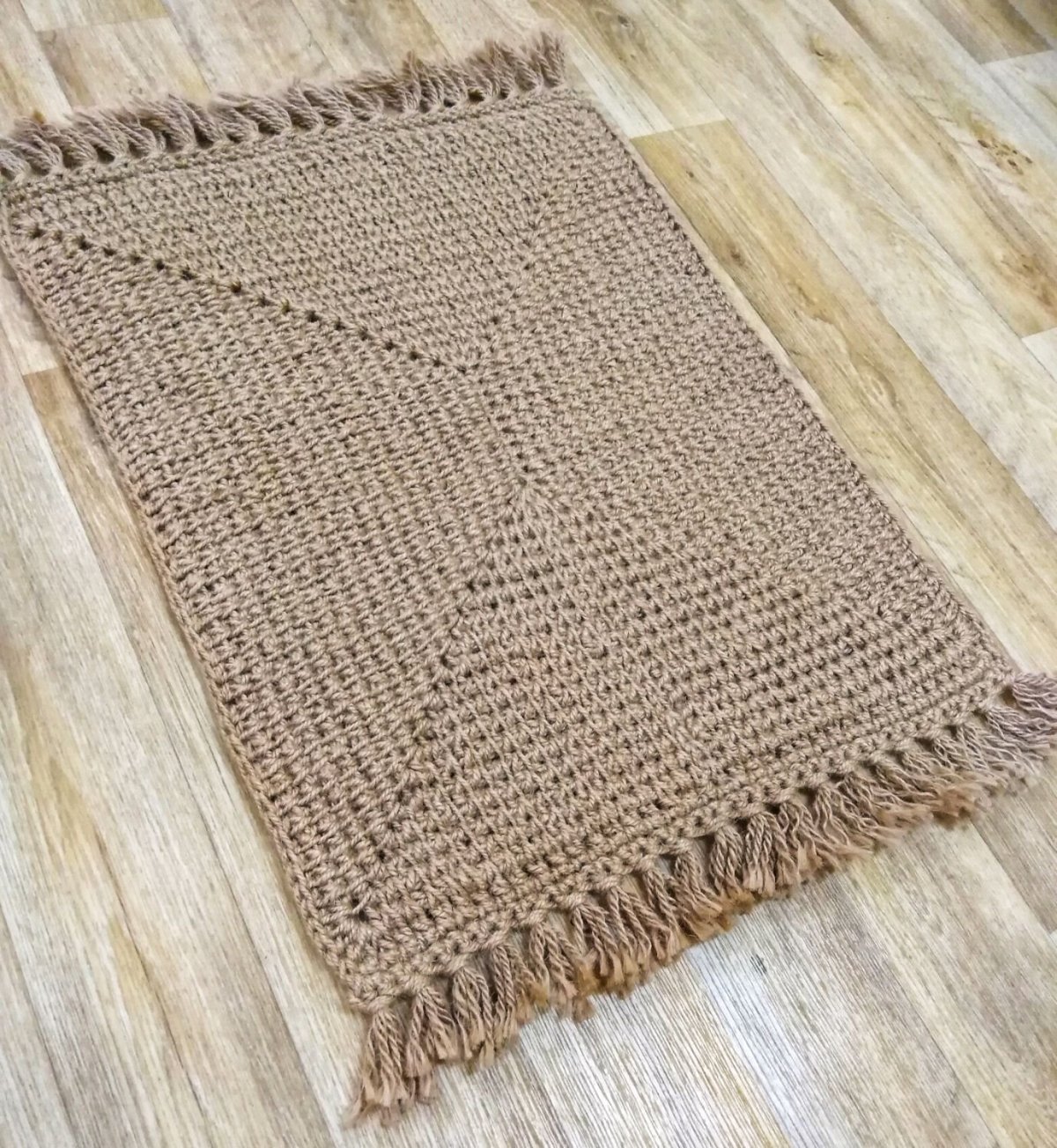 Круглый коврик из джута