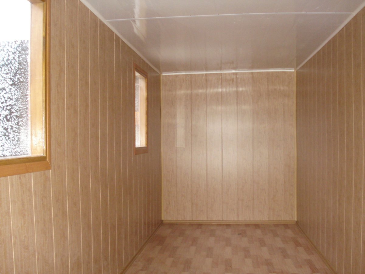 Отделка бытовки МДФ панелями