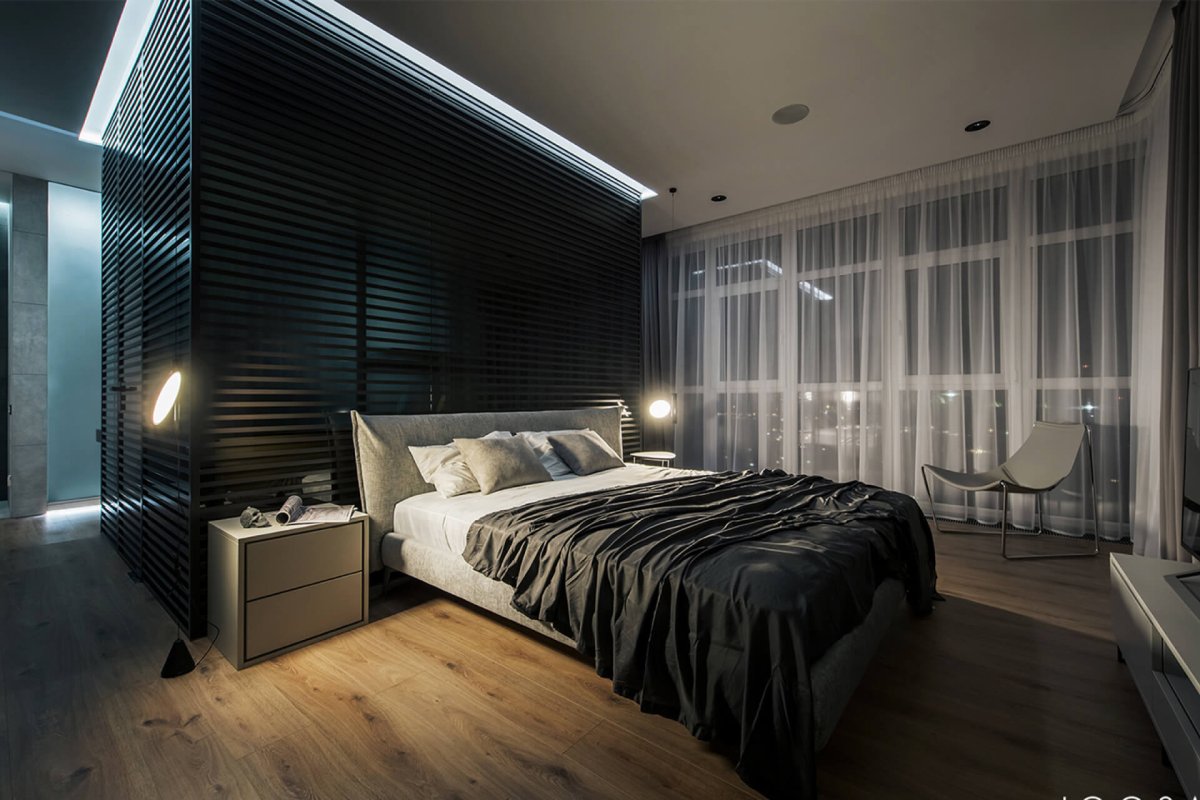 Комната с кроватью в темноте