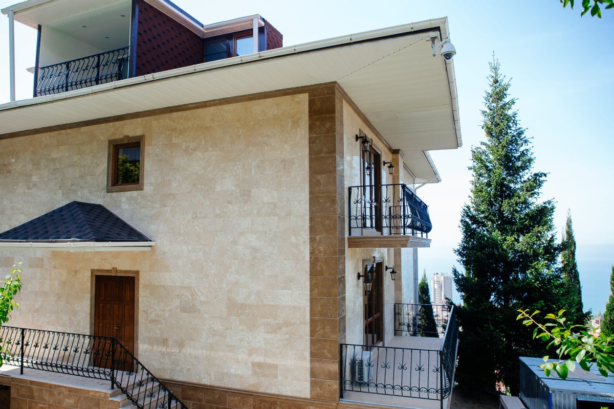 Покраска фасада дома