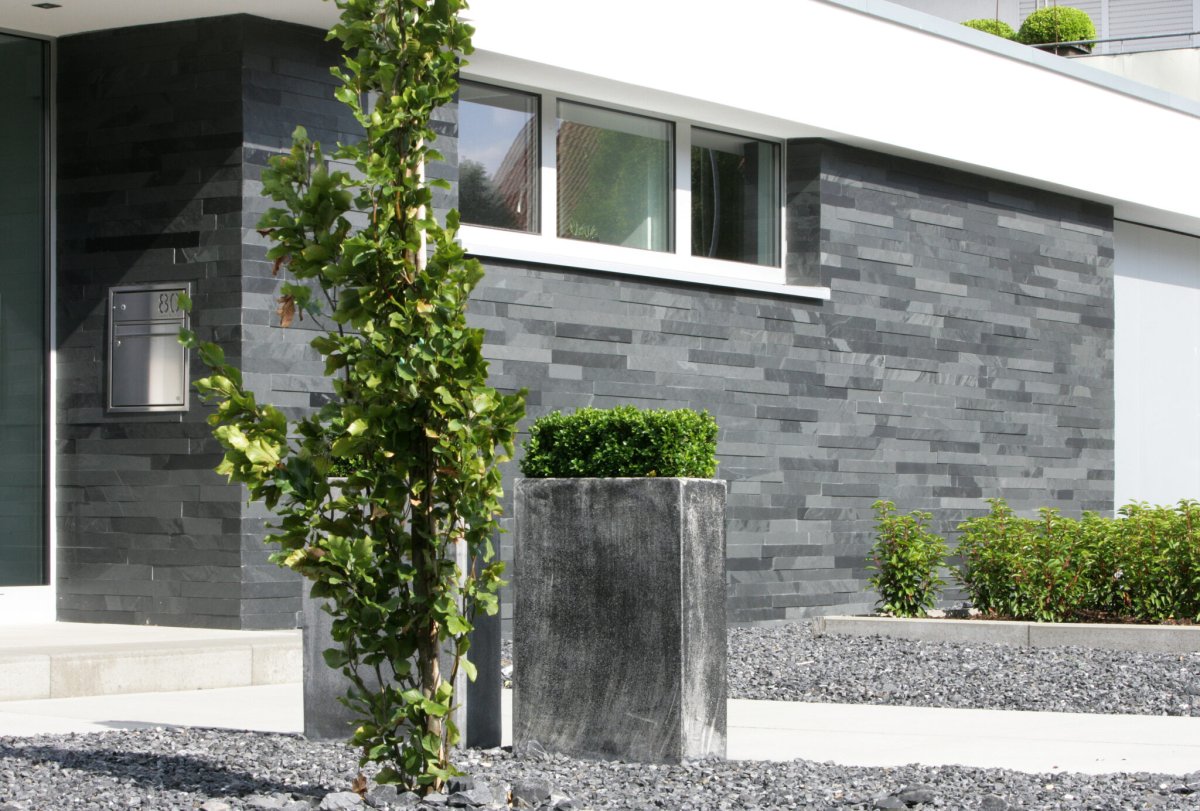 Отделка фасада под камень