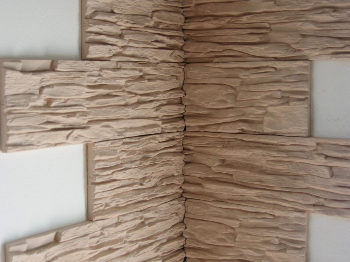 Отделка углов искусственным камнем