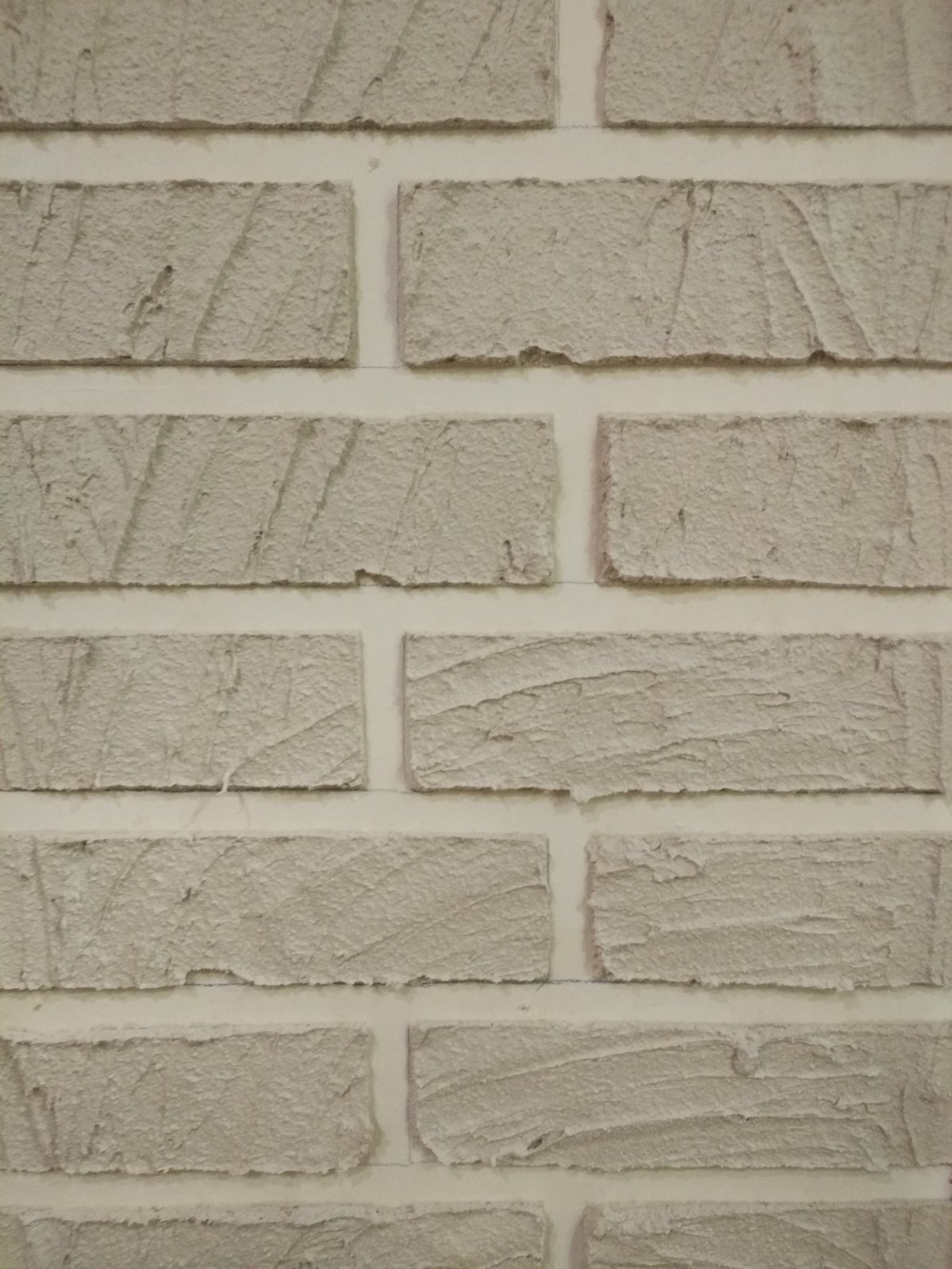 Имитация кирпичной кладки из штукатурки