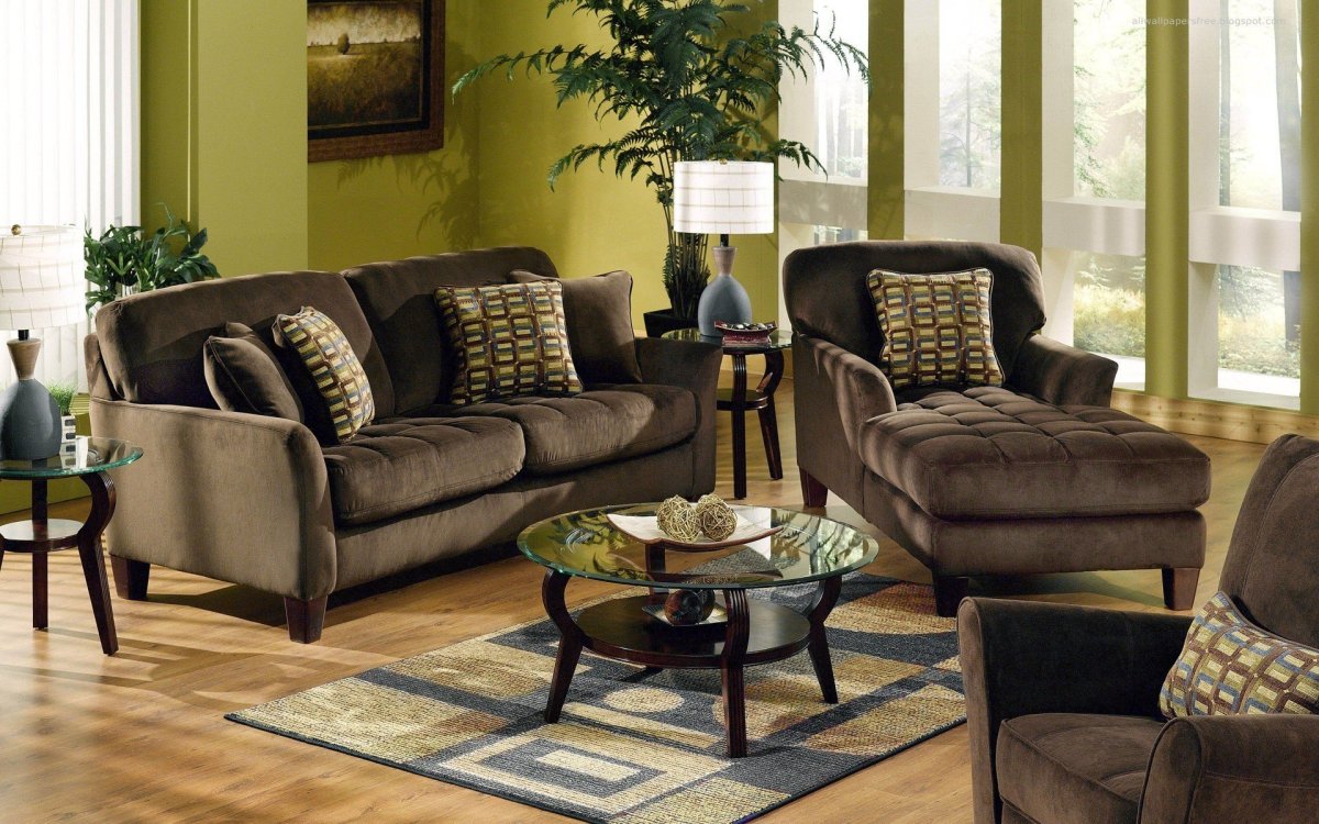 Зеленый велюровый диван в интерьере