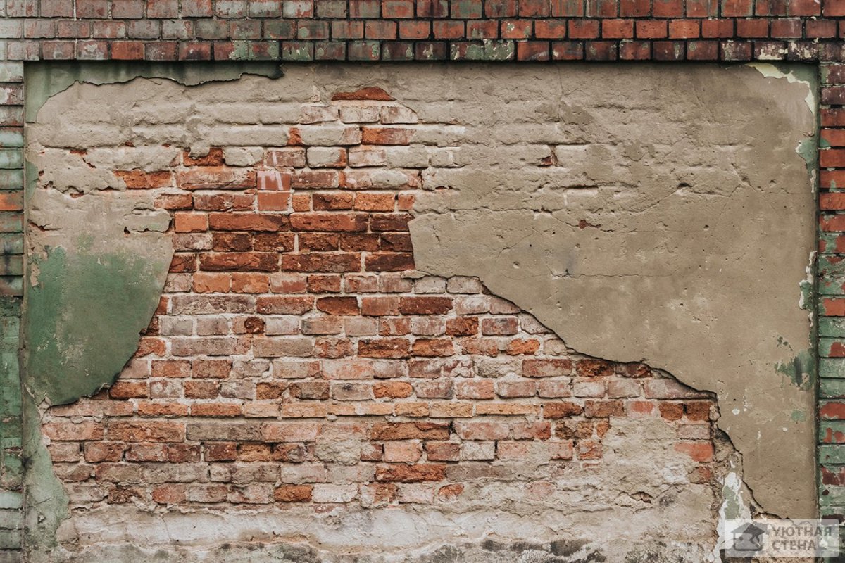 Обшарпанная кирпичная стена