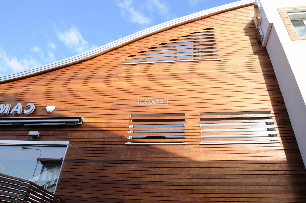 Отделка фасада под дерево