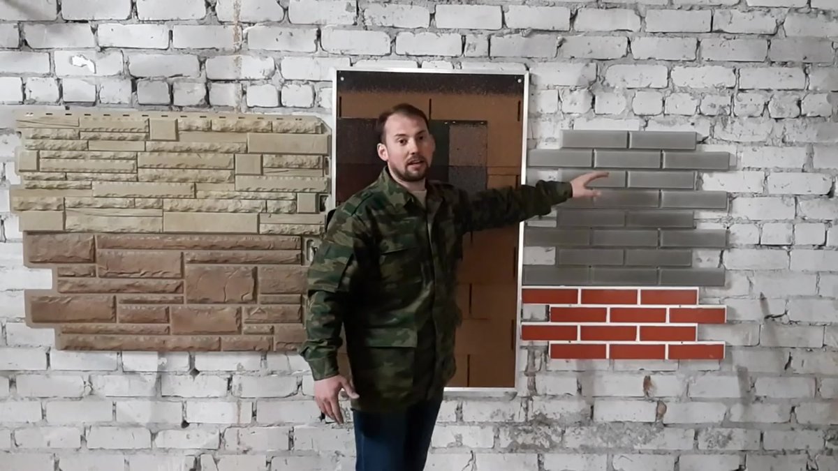 Отделка фасадными панелями под камень