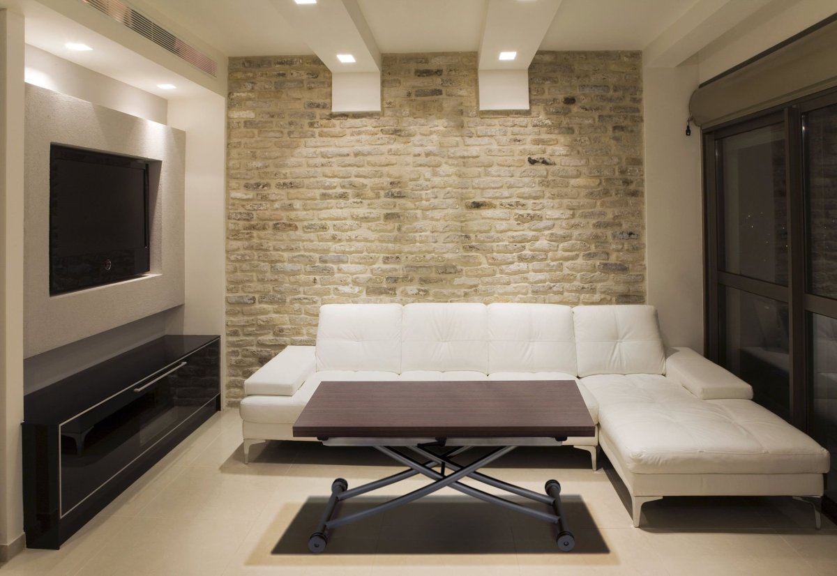 Гипсовый камень в интерьере гостиной