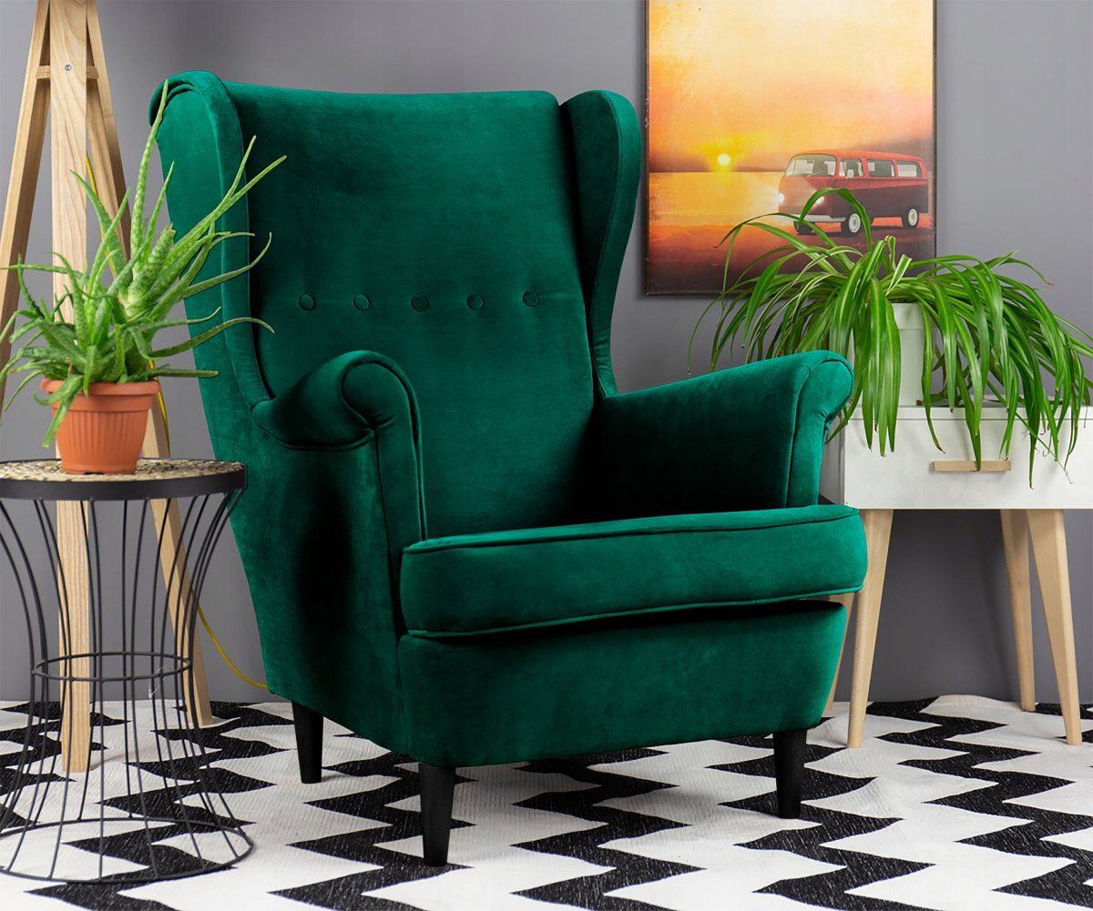 Кресло изумрудного цвета в интерьере