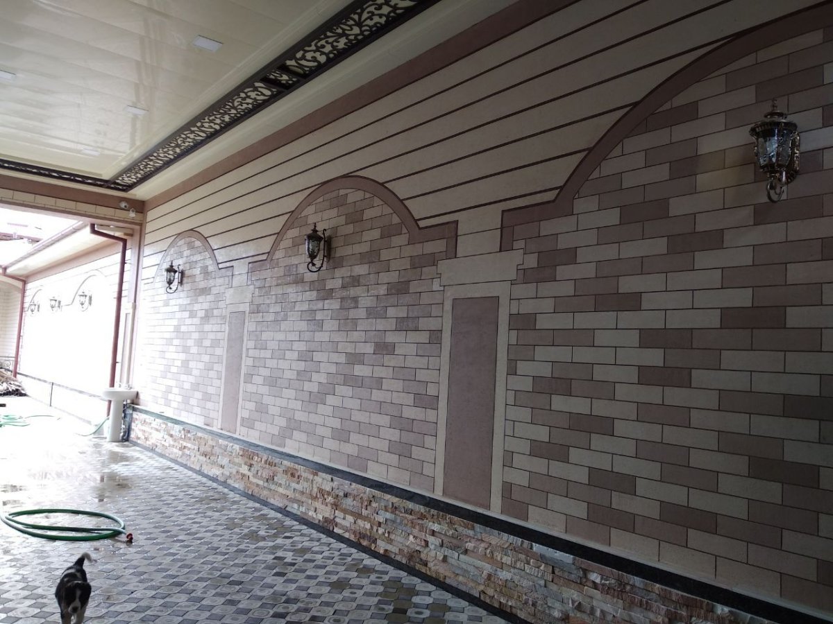 Фасад из жидкого травертина