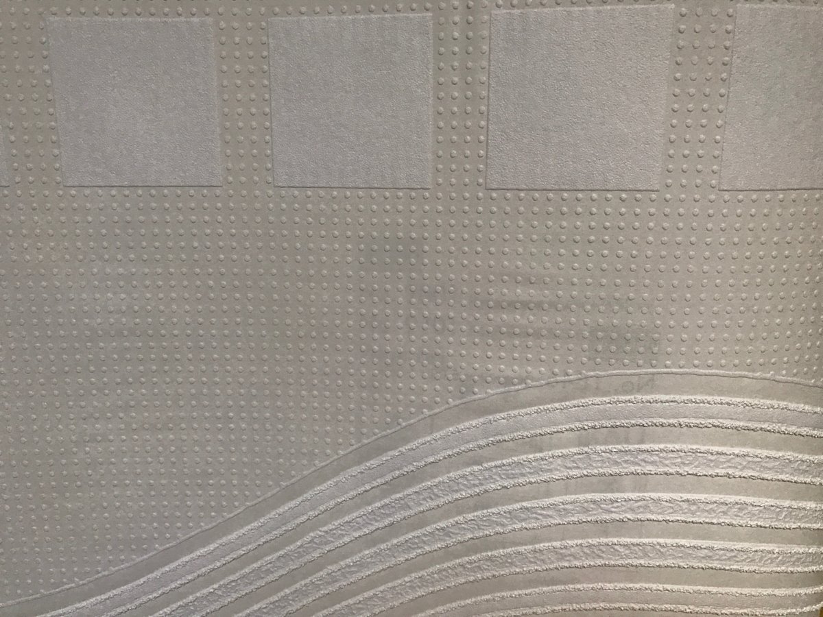 Наклеивание стеклохолста на стены