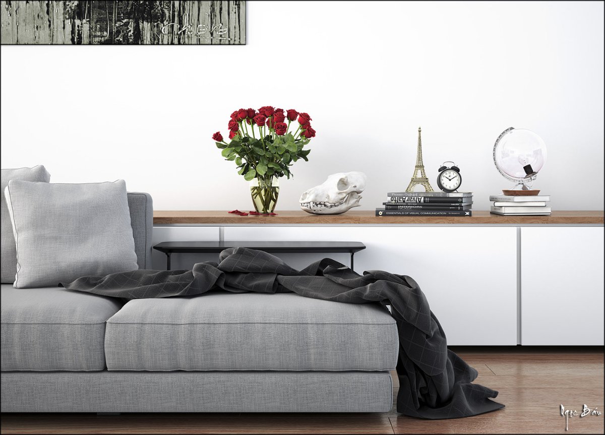 Серый диван с белым покрывалом