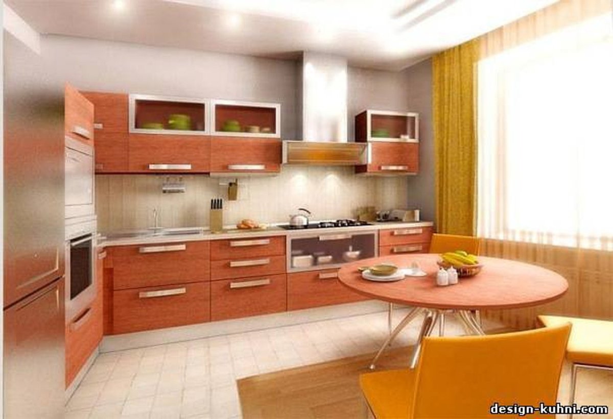 Интерьер кухни с оранжевым гарнитуром