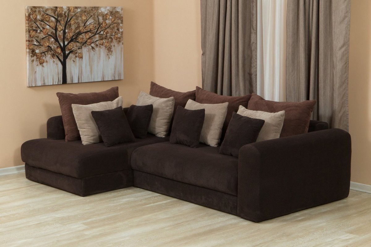 Зеленая подушка для дивана