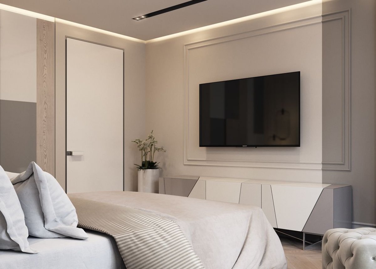 Интерьер спальни с телевизором