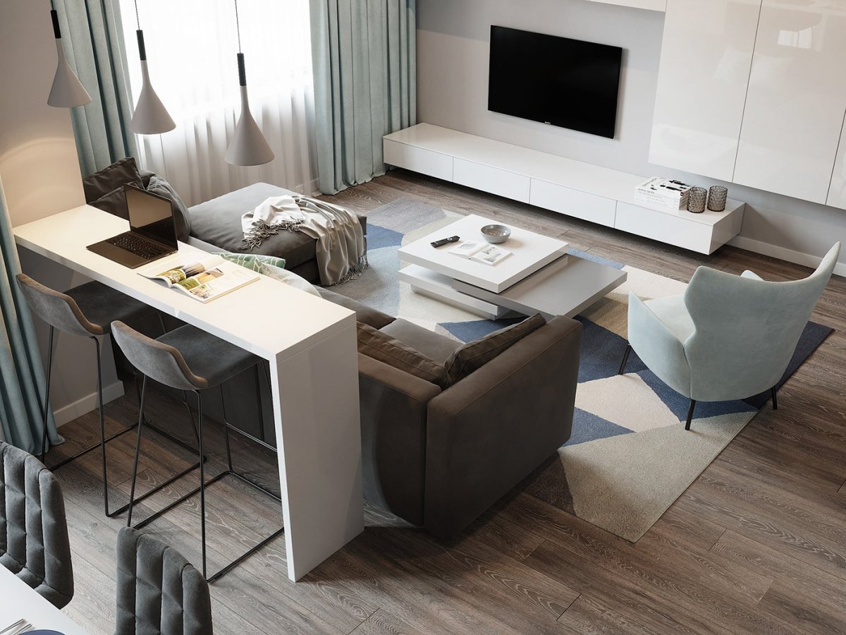 Обеденный стол рядом с диваном