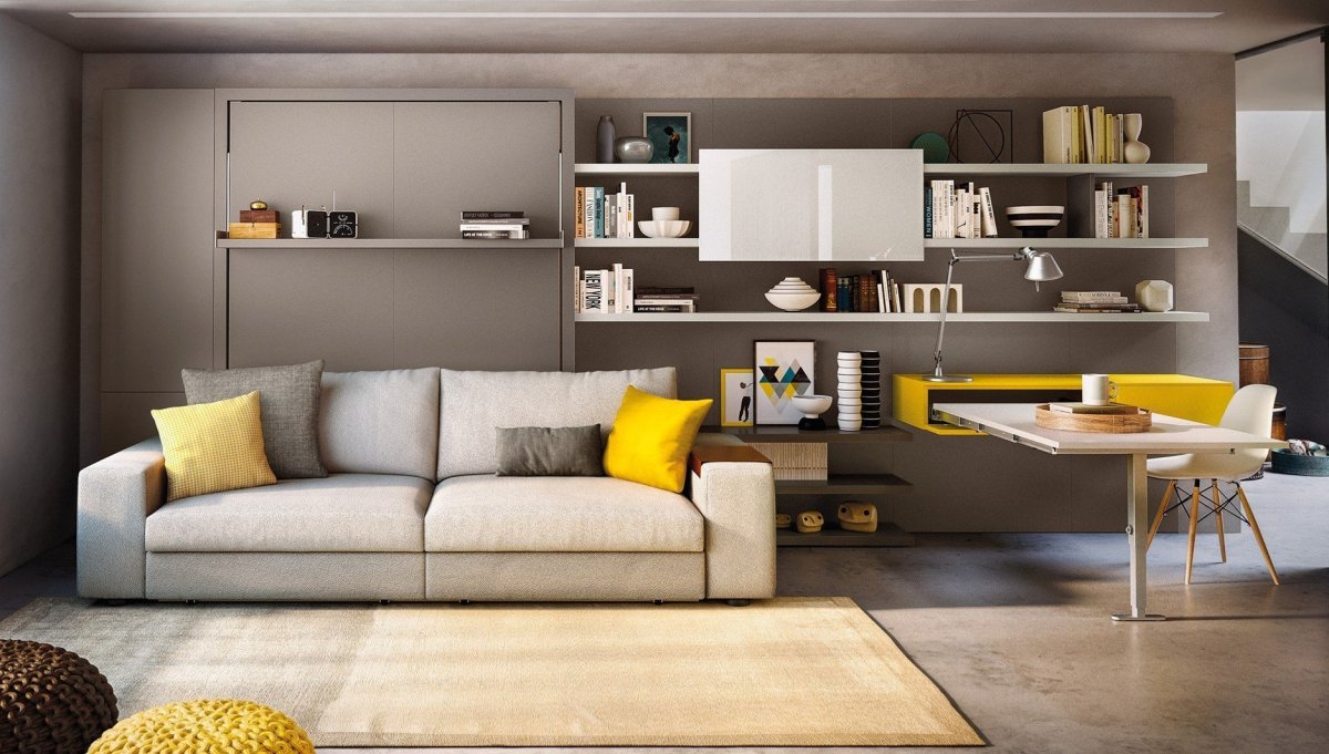 Зонирование комнаты угловым диваном