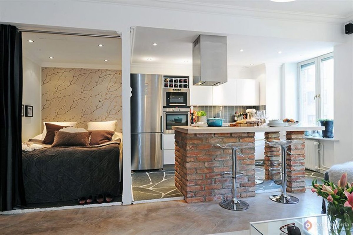 Расположение кухни в студии