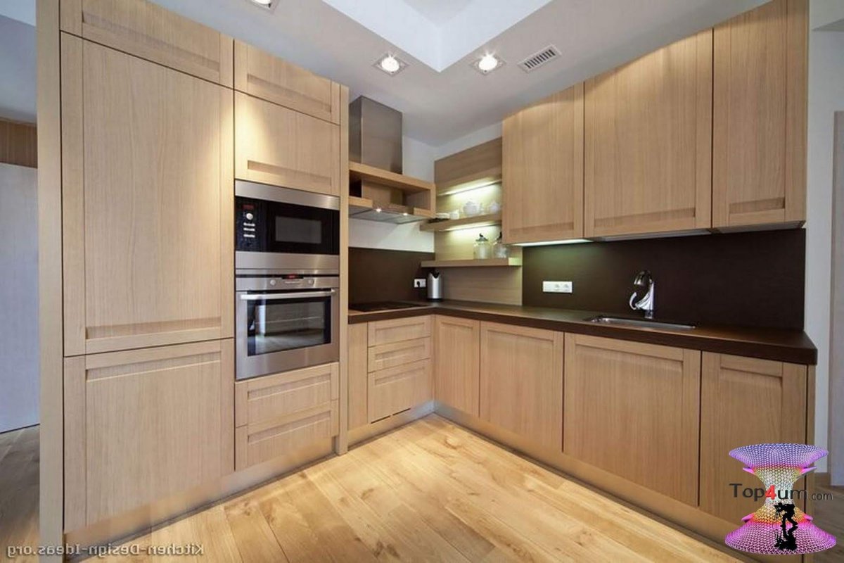 Сочетание коричневого дерева в интерьере кухни