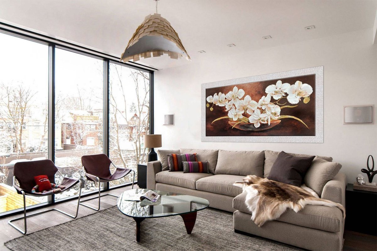 Декор над диваном в гостиной в современном стиле