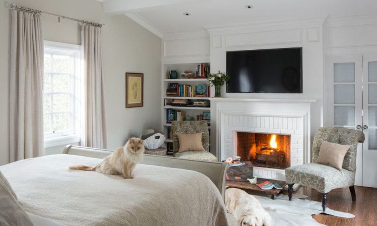 Спальня гостиная с камином