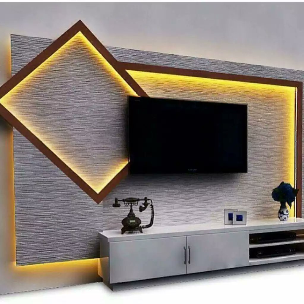Подсветка домашнего телевизора. Дизайнерская подсветка стен. Панель под телевизор на стену с подсветкой. Ниша под телевизор с подсветкой. Декорация на стену с подсветкой.