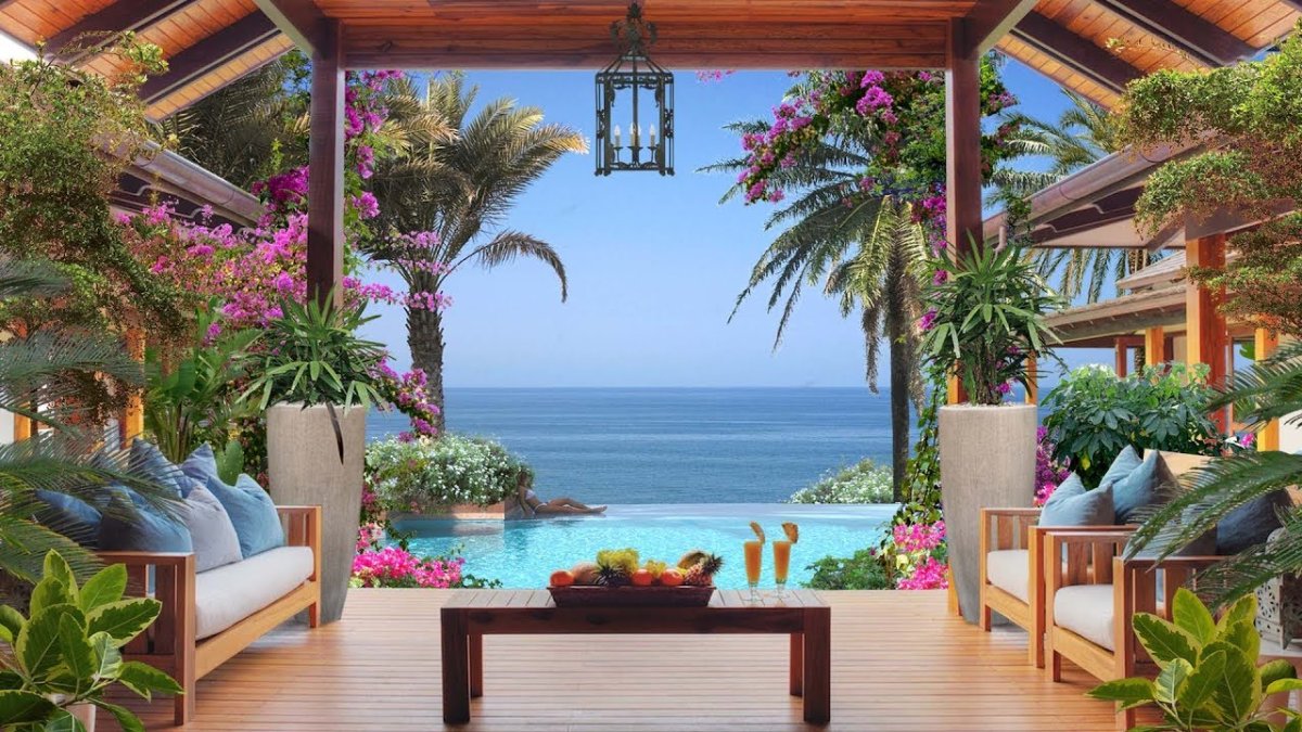 Домик у море с цветами