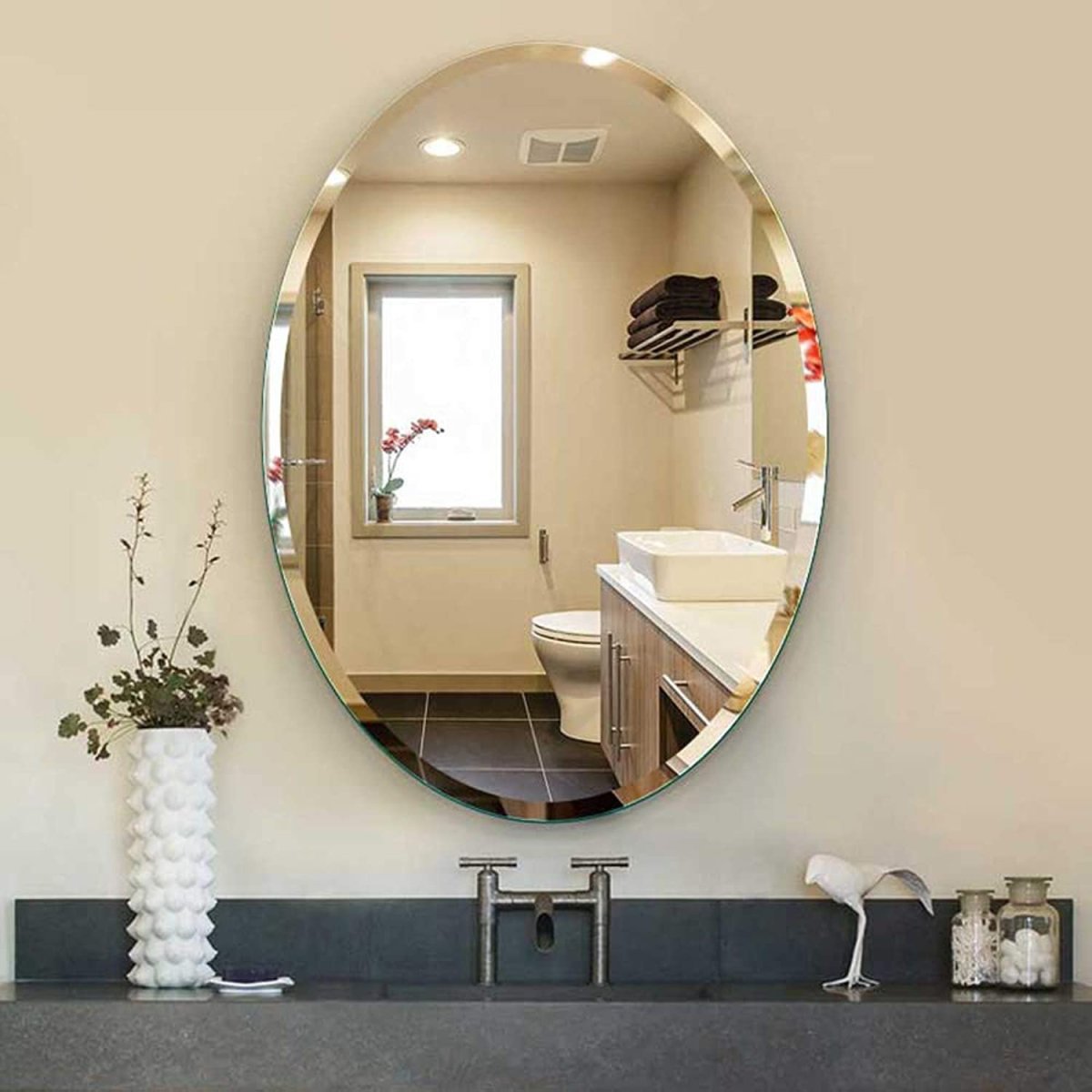 Овальное зеркало в ванную