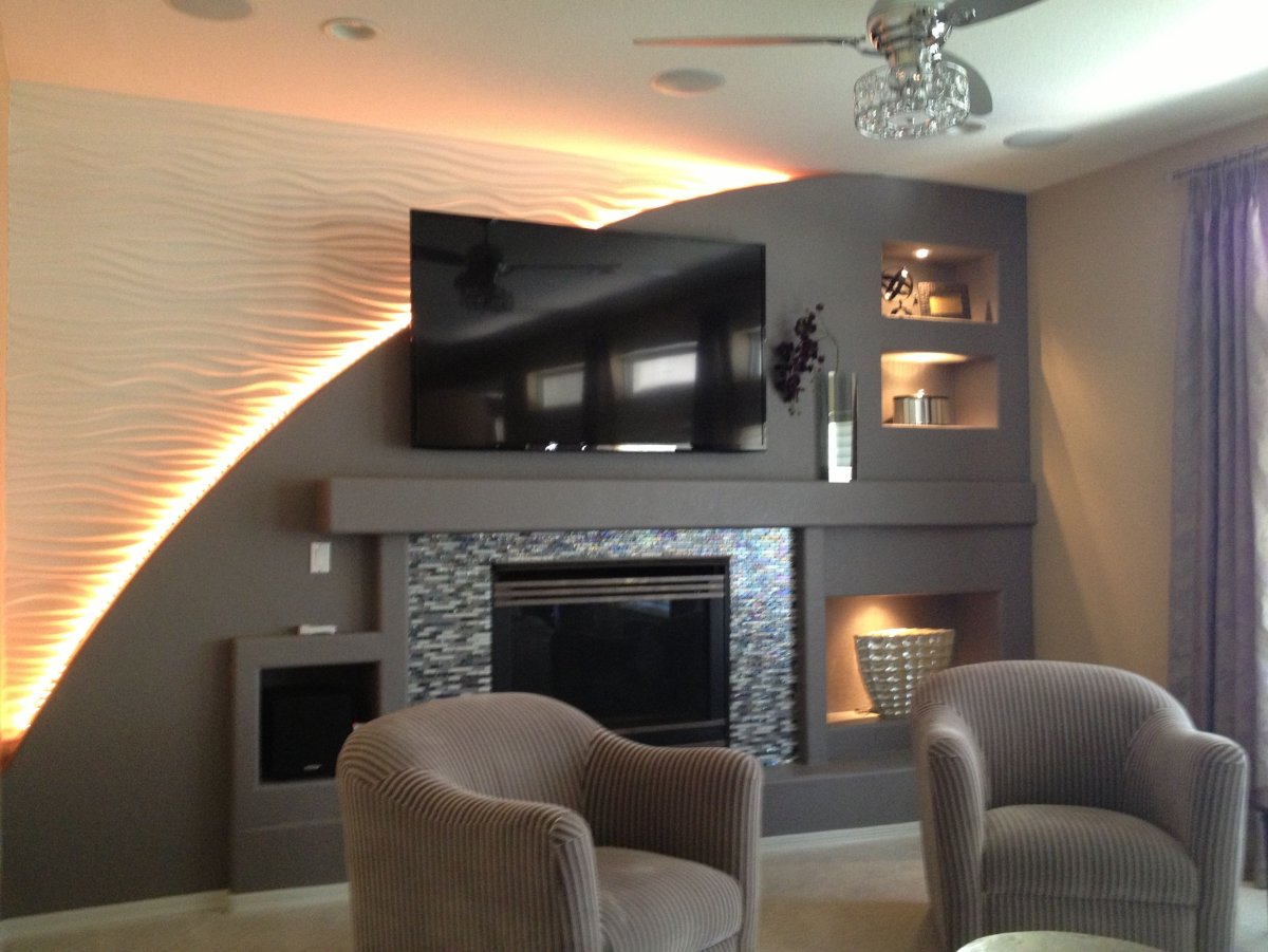 Стенка из гипсокартона под телевизор с камином