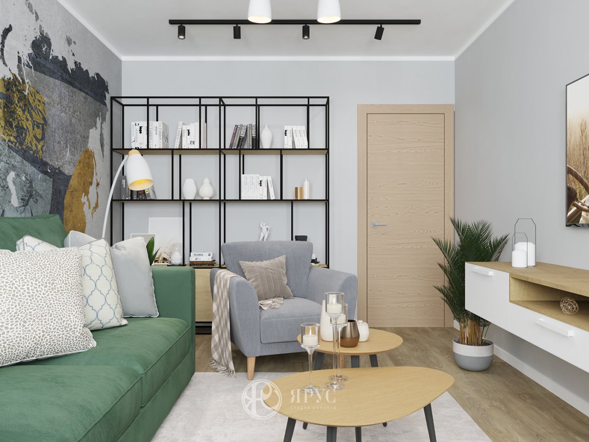 Гостиная в скандинавском стиле с зеленым диваном