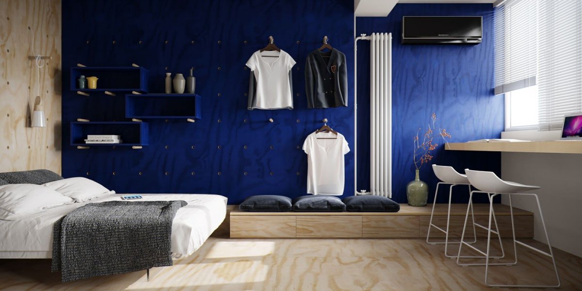 Синяя спальня с ламинатом на стене