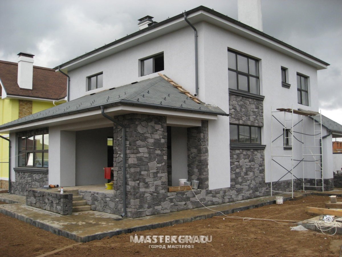 Отделка фасада камнем и штукатуркой
