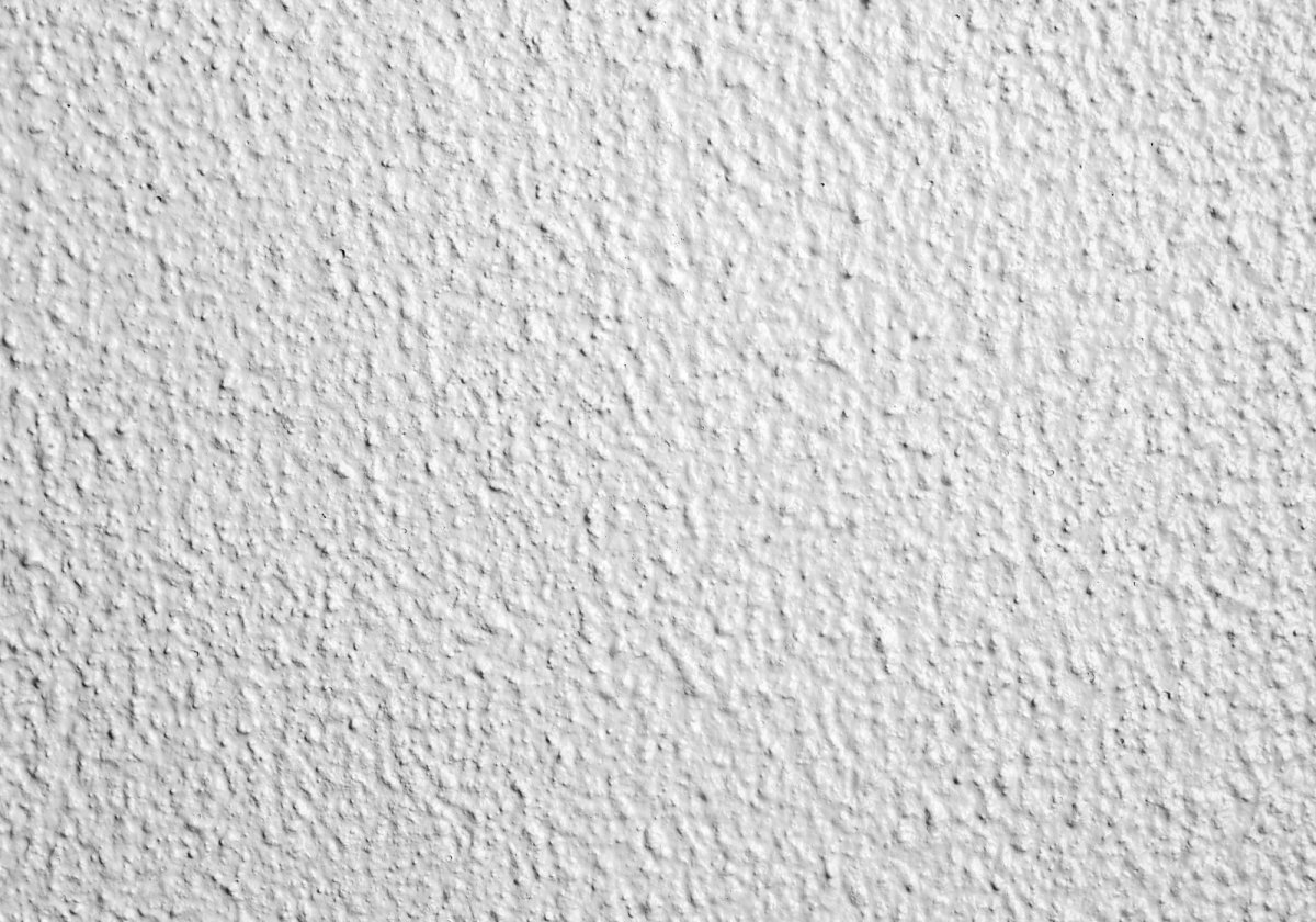 Белая шершавая стена