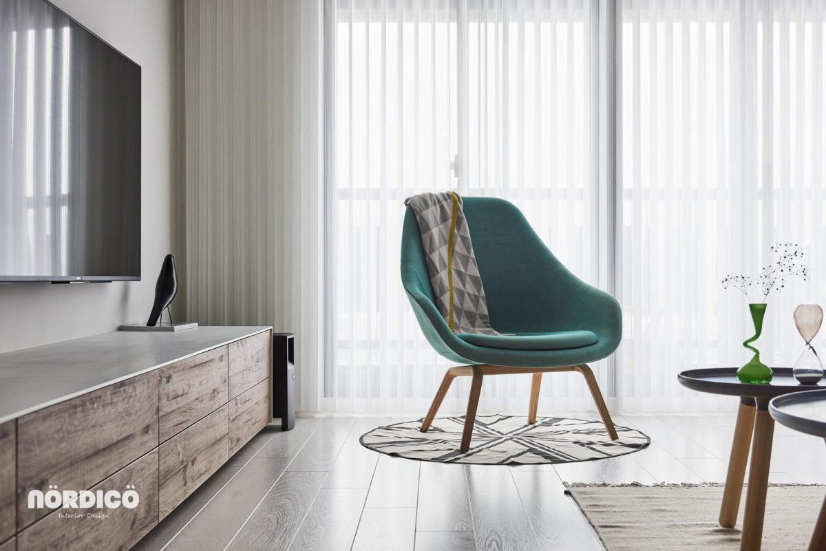 Зеленое кресло в скандинавском стиле