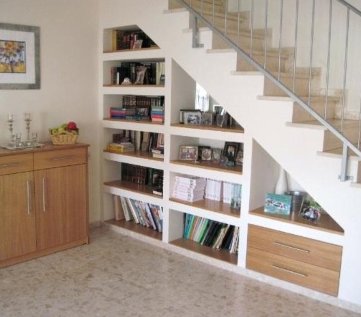 Полки под лестницей в частном доме