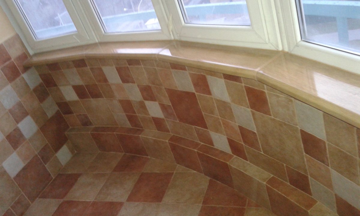 Отделка балкона плиткой