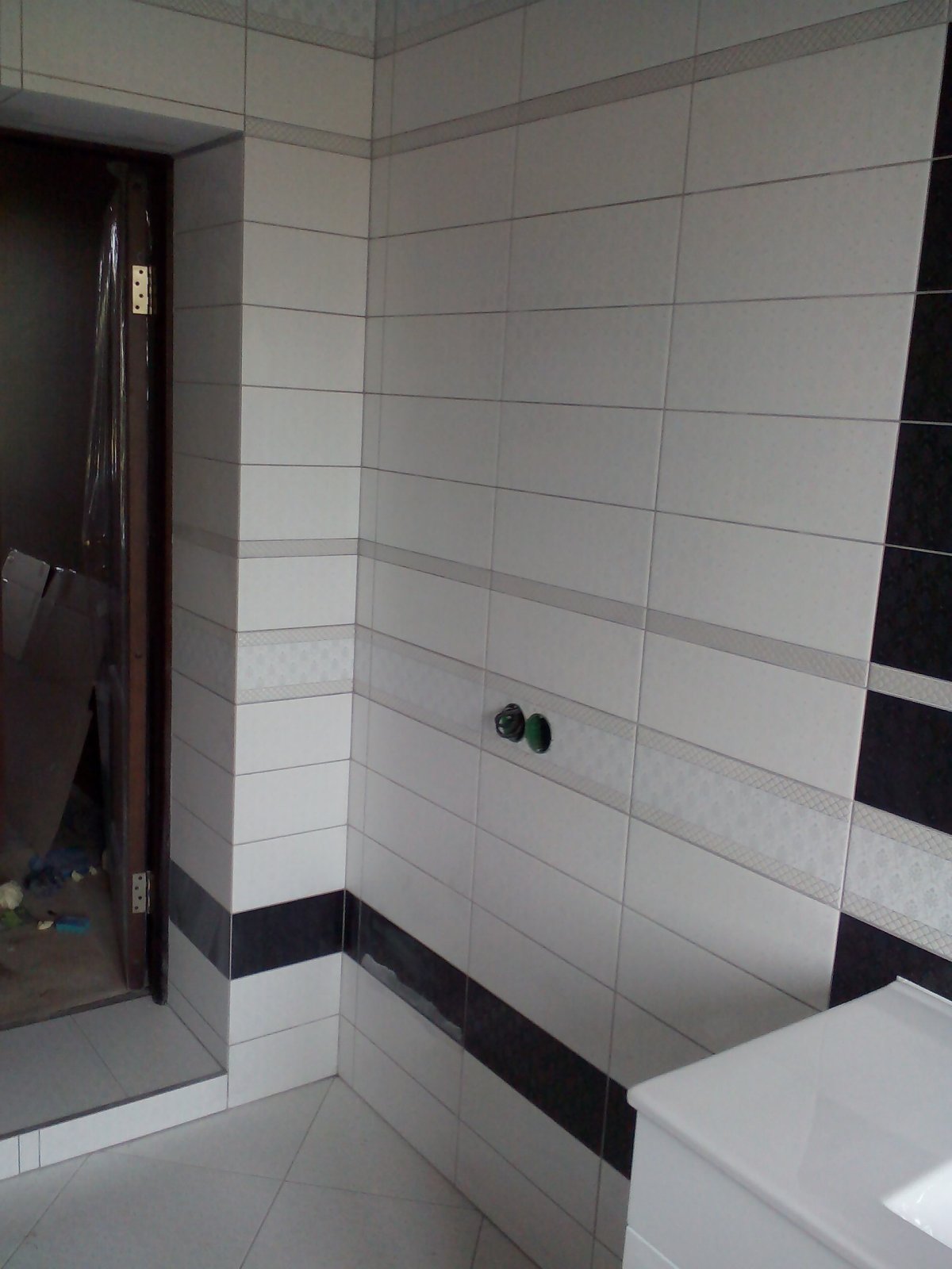 Откосы из плитки в ванной