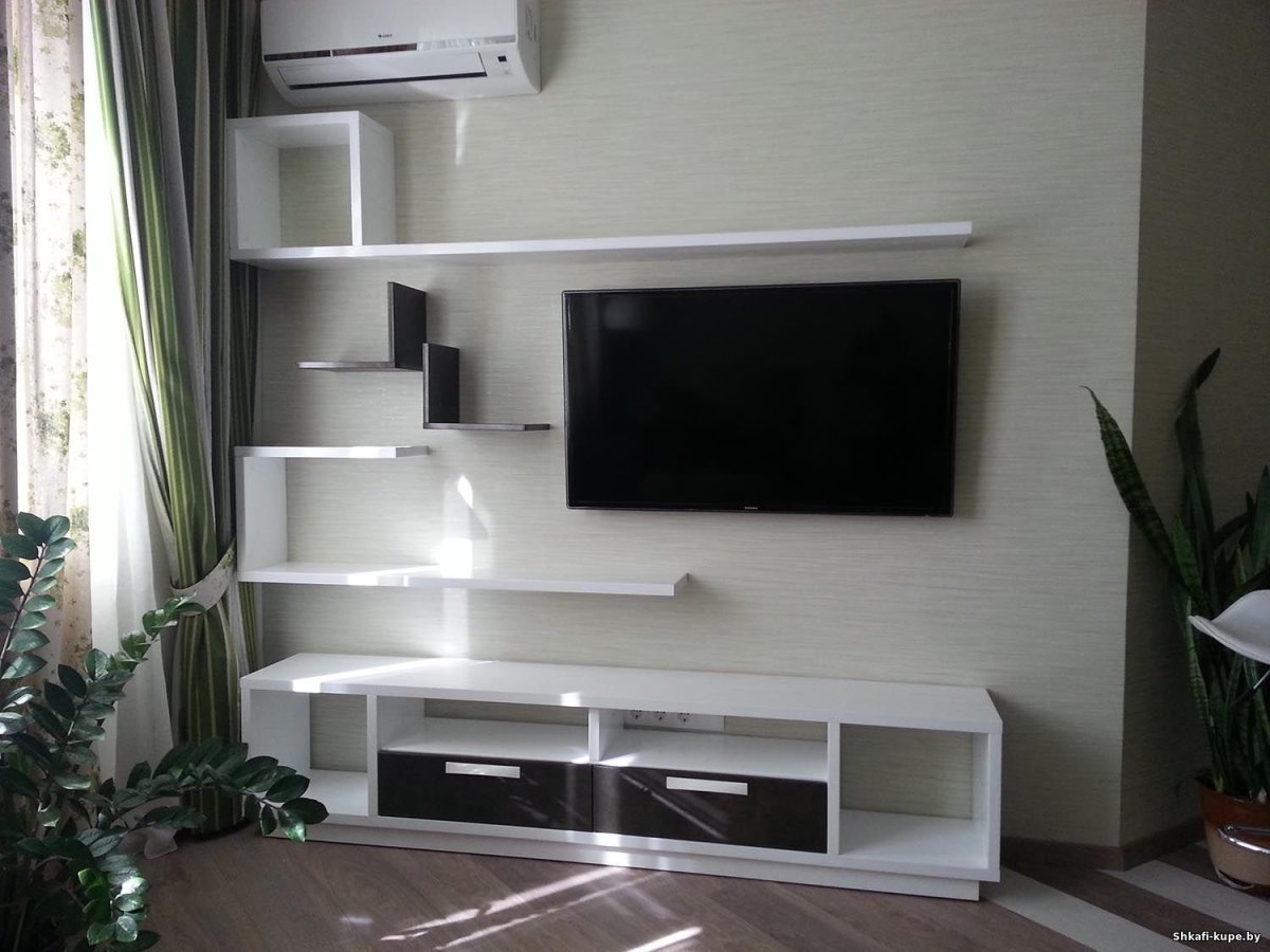 Тумбы под телевизор с полками на стене