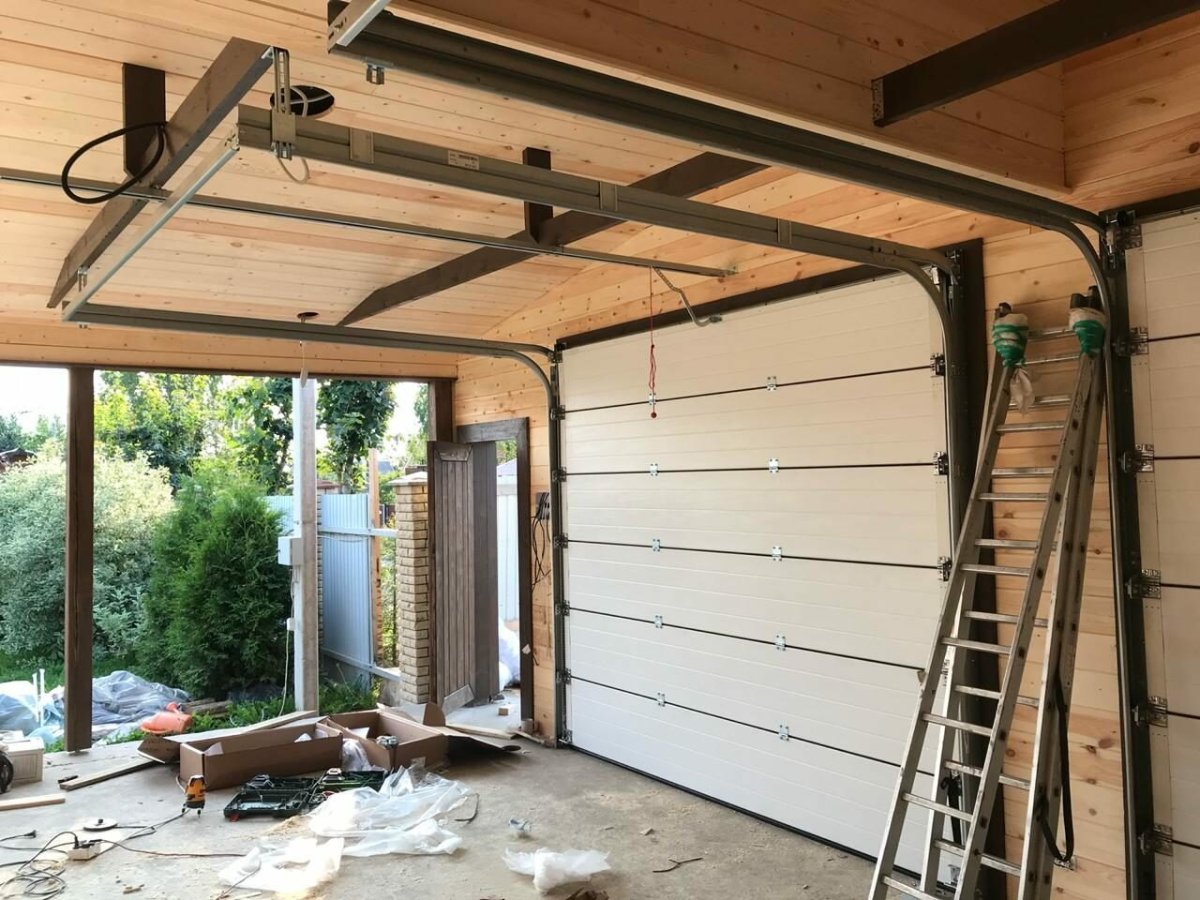 Монтаж секционные ворота Дорхан