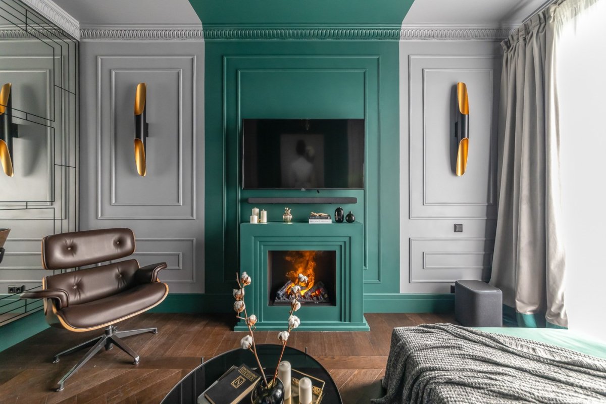 Камин в интерьере изумрудного цвета