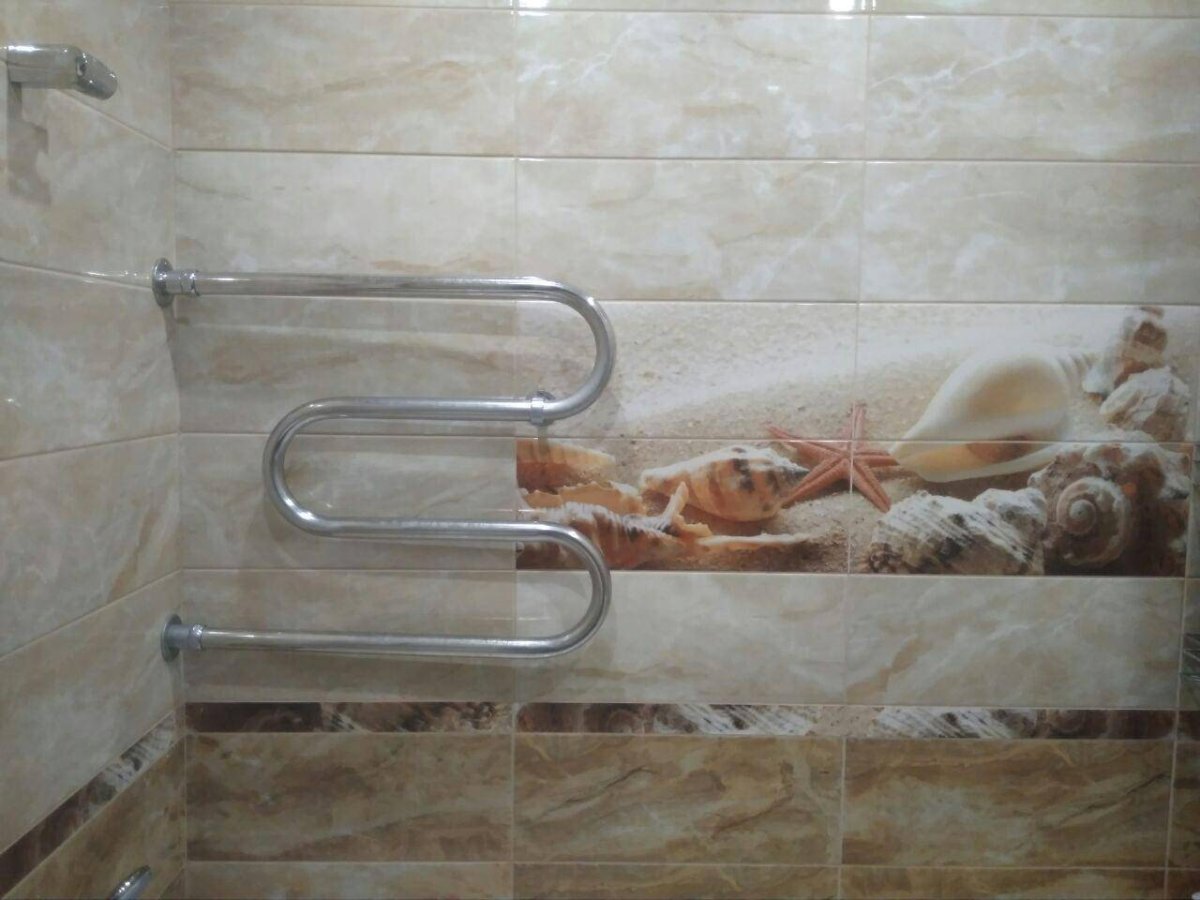 Полотенцесушитель на стене